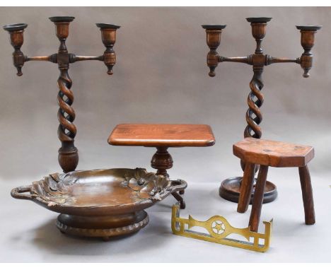 A pair of oak open twist three light candelabra, an apprentice made snap top table, milking stool, brass miniature fender, Ar