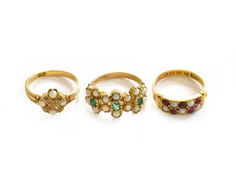 A 9 carat gold emerald and split pearl cluster ring, finger size M; an 18 carat gold ruby and split pearl ring, finger size M