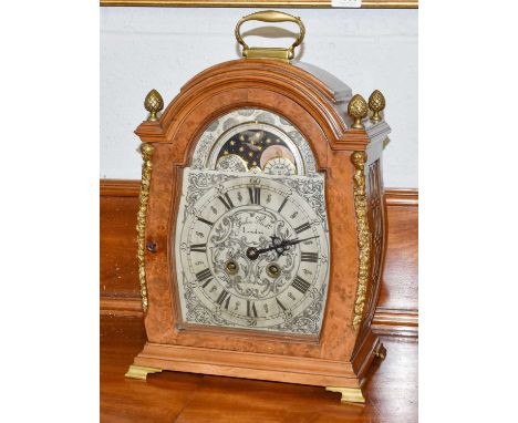 An 18th century style striking table clock, 20th century, silvered dial with Roman and Arabic numerals and bearing a later in