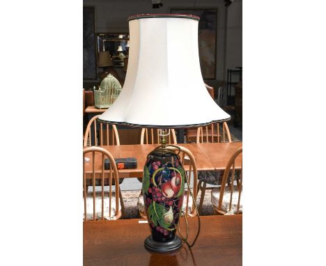 A modern Moorcroft tablelamp base, 'Queens Choice' designed by Emma Bossons, 29cmLamp base in good condition, free from damag