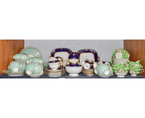 A Coalport tea and coffee service, retailed by James Green, a similiar 19th century porcelain tea and coffee service on turqu