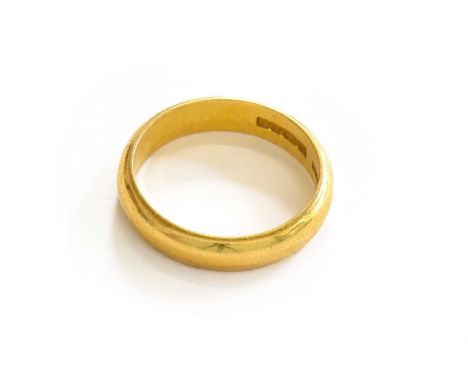 A 22 carat gold band ring, finger size OThe ring is in good condition with slight surface scuffing. It is hallmarked with mak