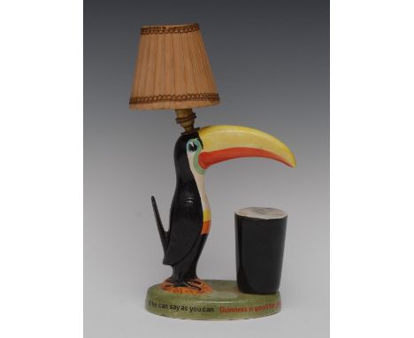 Guinness - a Carlton Ware Toucan lamp, he stands by a pint of Guinness, the oval base inscribed How grand to be a Toucan Just