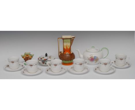 A Shelley compressed ovoid teapot and cover, printed and painted with hydrangea and butterflies, pattern 2221, printed marks;