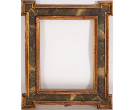 In gilded and ebonized wood. Exterior measurements: 57 X 47, light measurements: 38 X 28
