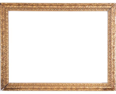 In carved gilded wood. Exterior measurements: 189 x 146, light measurements: 168 x 124