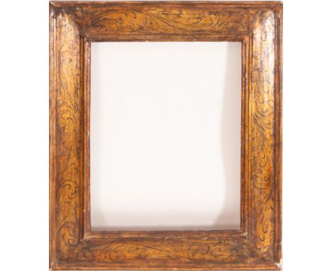 In polychrome and gilt wood. Exterior measurements: 66 X 55, light measurements: 49 x 38