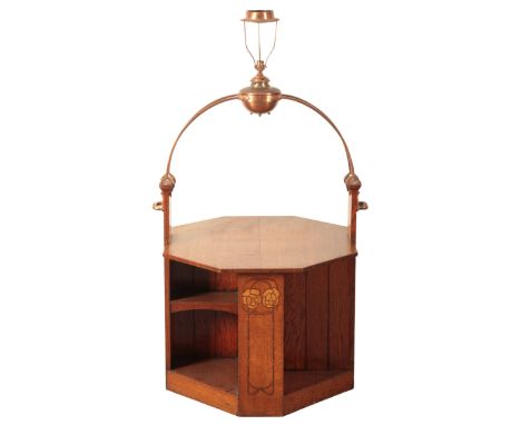 AN ARTS AND CRAFTS OCTAGONAL OAK TABLE WITH INBUILT COPPER OIL LAMP SUPERSTRUCTUREin the manner of Shapland & Petter Ltd. of 
