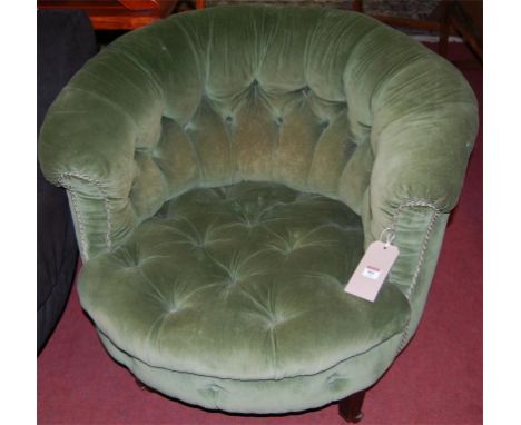 A Victorian green button back upholstered low tub chair