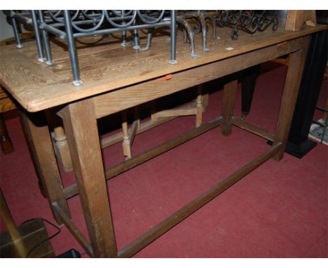 An early 20th century light oak altar table