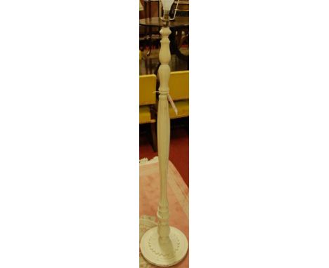 A white painted standard lamp 
