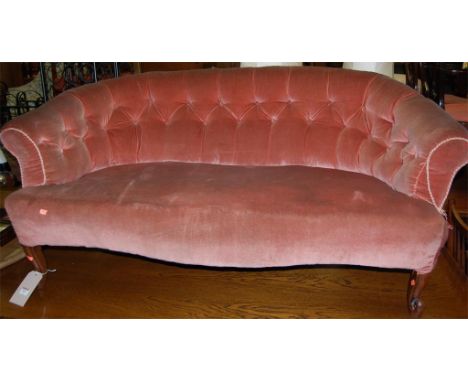 A Victorian walnut framed and pink upholstered button back two seater settee Condition Report / Extra Information Upholstery 