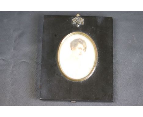 Mary Strange Reeve, an oval portrait miniature on ivory depicting a brown haired brown eyed lady in pale blue gown, paper lab