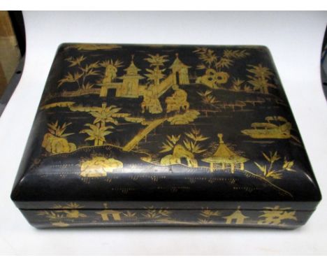 A mid 19th century gilt black lacquer box, containing two other boxes, a Canton enamel bowl and saucer, a late 18th century p
