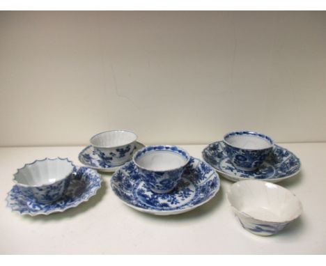 A collection of nine blue and white tea wares the earlier wares painted with flowers on lobed grounds, the later tea bowl wit
