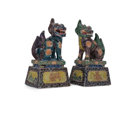 A pair of Japanese Kutani polychrome decorated temple dogs, 20th century, 20.5cm high (2)Provenance: From the estate of Lione