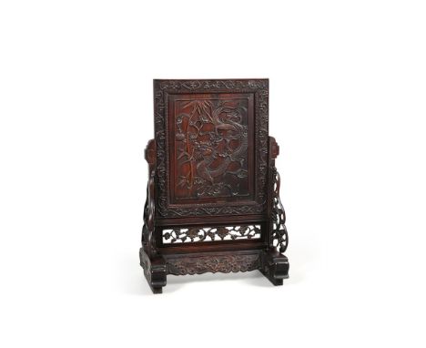 A Chinese Hongmu screen, Qing dynasty, late 19th century, the front panel carved with a dragon facing a flaming pearl, the fr