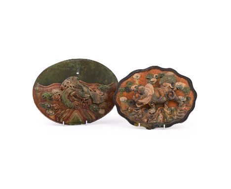 A Chinese sancai-glazed tile and a wall pocket, Ming dynasty, both covered in sancai green, amber and cream glaze, the tile m