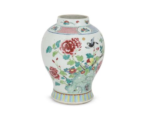 A Chinese Famille Rose vase, Qing Dynasty, 19th century, painted with a pair of magpies amongst flowers and foliage, 33cm hig