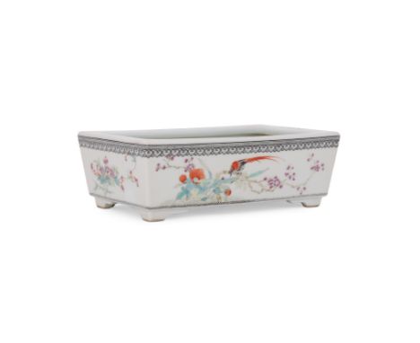 A Chinese Famille Rose jardinière, Republic, well painted with birds perched in flowering branches, black scroll borders, apo