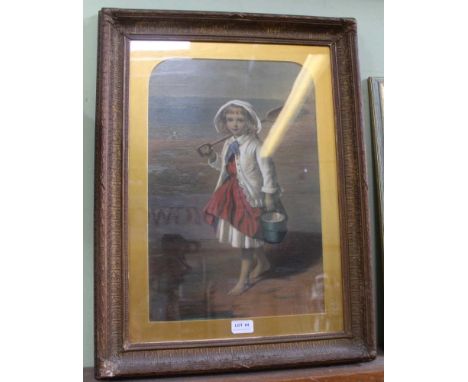 A 19TH CENTURY OLEOGRAPHIC TEXTURED PRINT, of a young girl on a beach with bucket &amp; spade, 49cm x 32cm, gilt mounted in p