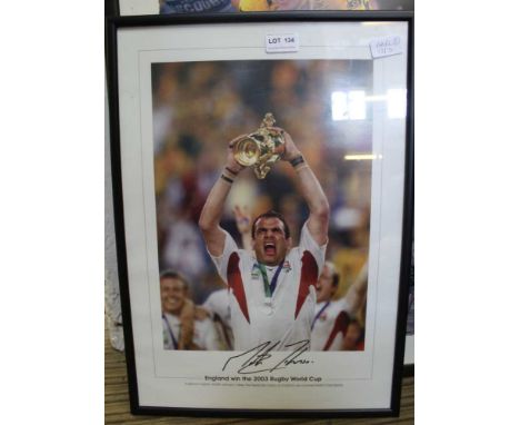 A LIMITED EDITION SIGNED MARTIN JOHNSON RUGBY WORLD CUP PHOTOGRAPH 