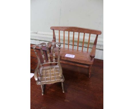 A SCRATCH BUILT MINIATURE STICK BACK SETTLE together with a cast brass rocking armchair 
