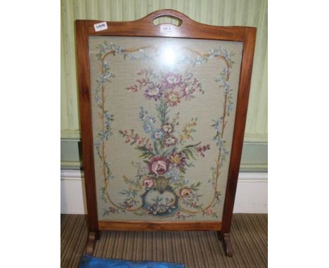 A 1ST QTR 20TH CENTURY MAHOGANY FRAMED &amp; GLAZED FLORAL TAPESTRY WOOLWORK, mounted as a fire screen 