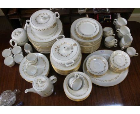 AN EXTENSIVE ROYAL WORCESTER VERONA PATTERNED TEA &amp; DINNER SERVICE, plain white glazed with over gilt highlights 