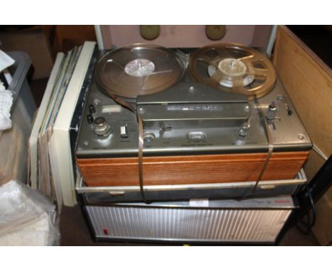 A BUSH RECORD PLAYER TOGETHER WITH A TANDBERG REEL TO REEL PLAYER, AND A SMALL SELECTION OF RECORDS