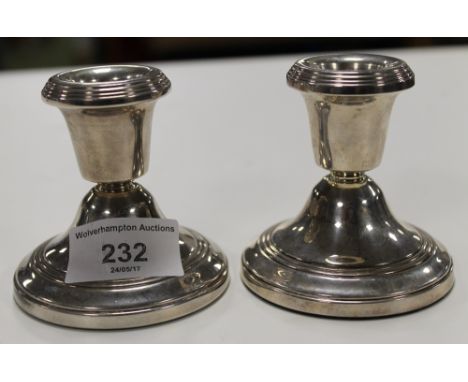 A PAIR OF HALLMARKED SILVER CANDLESTICK HOLDER