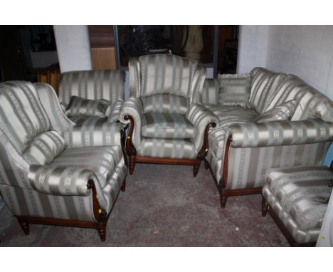 A MODERN EDWARDIAN STYLED WOODEN FRAMED FIVE PIECE SUITE, CONSISTING OF A SOFA, THREE CHAIRS AND A POUFFE 