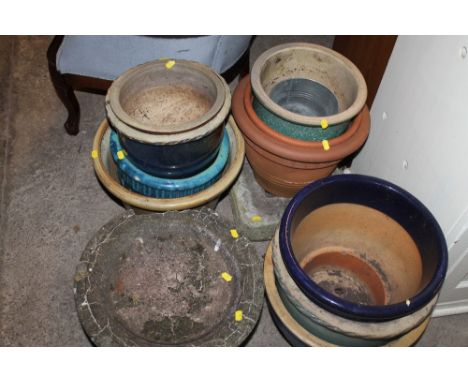 A QUANTITY OF VARIOUS CERAMIC PLANT POTS, TOGETHER WITH A STONE BIRD BATH A/F