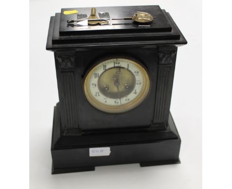 A SLATE MANTLE CLOCK WITH PENDULUM AND KEY