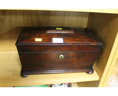 A SARCOPHAGUS SHAPED TEA CADDY WITH FITTED INTERIOR 