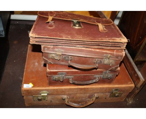 THREE VINTAGE LEATHER SUITCASES, TOGETHER WITH A BAG