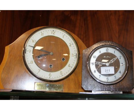 A 1950S MANTEL CLOCK AND KEY WITH ANOTHER MANTEL CLOCK 