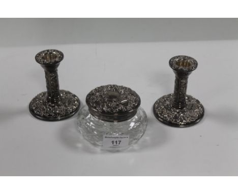 A PAIR OF HALLMARKED SILVER DWARFED CANDLE STICKS TOGETHER WITH A HALLMARKED SILVER LIDDED CUT GLASS JAR 