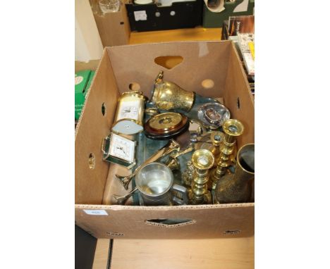 A TRAY OF ASSORTED METALWARE TO INCLUDE A PAIR OF BRASS CANDLE STICKS CLOCKS, BAROMETER, ETC 