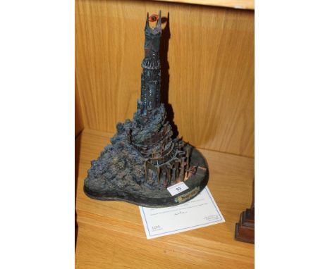 A DANBURY MINT LORD OF THE RINGS 'BARAD DUR THE DARK TOWER OF SAURON' SCULPTURE WITH LED LIGHT UP EYE