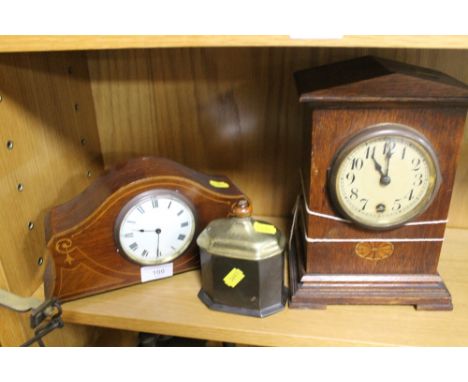 TWO EDWARDIAN MANTEL CLOCKS WITH INLAID DECORATION TOGETHER WITH AN IRON AND BRASS TOBACCO JAR