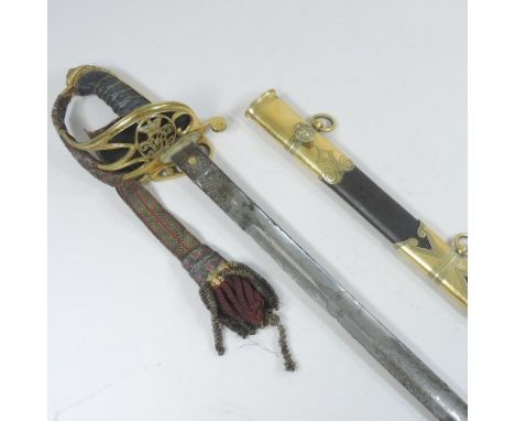 A Victorian 1822 pattern infantry officer's sword, the pierced brass gothic hilt with V R cypher, with a hinged side, and bou