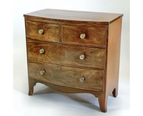 A George III mahogany bow front chest, containing two short over two long drawers, on swept bracket feet, 90cm 