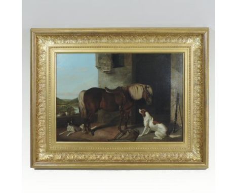 E. J. Keeling, act.1856-1873, a pony with hunting dogs before a stable, signed oil on canvas, 39 x 55cm