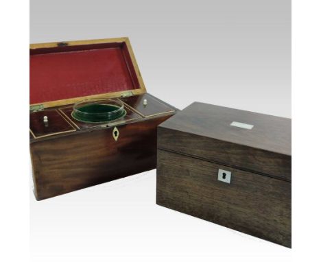 A late Regency mahogany and boxwood strung tea caddy, of plain rectangular shape, with a fitted interior, containing a pair o