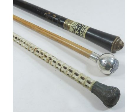 A 19th century vertebrae walking stick, 79cm long, together with an early 20th century Indian swordstick and an early 20th ce