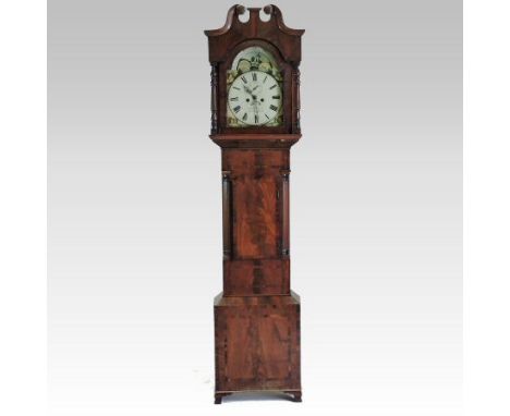 A 19th century mahogany and crossbanded cased long case clock, with a broken arch pediment, the arched painted dial with a mo