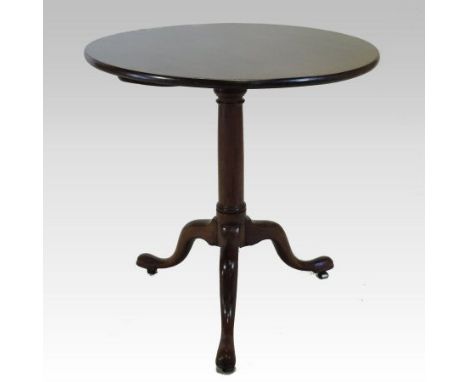 A George III mahogany occasional table, with a circular tilt top, on a tripod base, 74cm