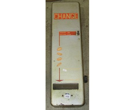 A vintage wall mounted cast metal coin operated pre-decimal change dispenser, 21 cm wide (excluding knob) x 76 cm high x 12 c