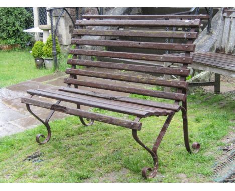 A vintage sprung steel two seat garden bench with weathered timber lathes 122 cm wide 